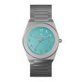 Clasicio Fayrouz watch featuring a turquoise dial with silver Arabic numerals and a silver stainless steel band.