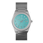 Clasicio Fayrouz watch featuring a turquoise dial with silver Arabic numerals and a silver stainless steel band.
