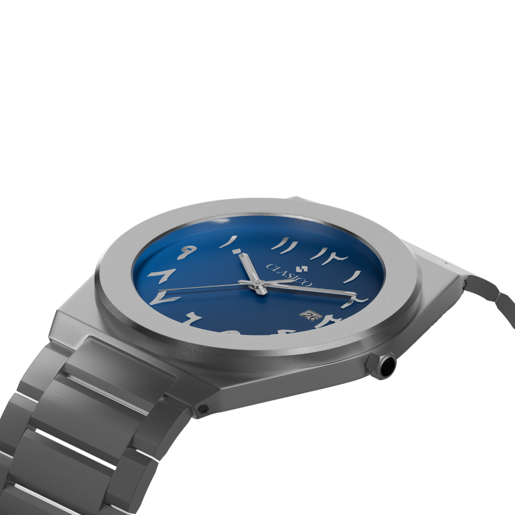 Silver Bahr watch by Clasicio from the Dawr Collection, showcasing the integrated bracelet and date display window.