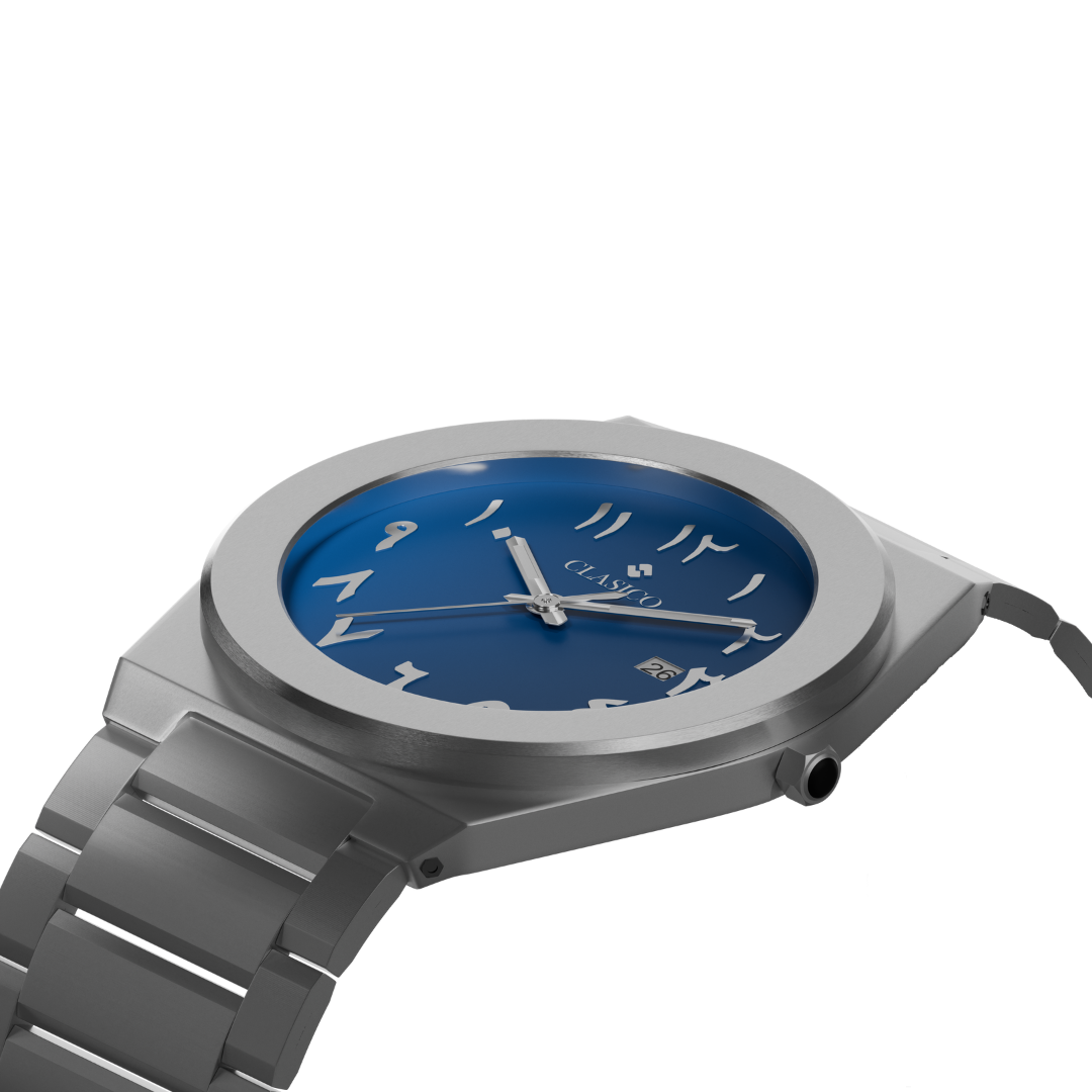 Silver Bahr watch by Clasicio from the Dawr Collection, showcasing the integrated bracelet and date display window.