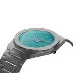 Silver Clasicio Fayrouz watch from the Dawr Collection showing the integrated bracelet and date window.