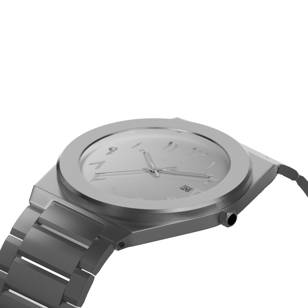 Silver Noor watch by Clasicio from the Dawr Collection, showing the sophisticated brushed metal finish and date window.