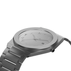 Silver Noor watch by Clasicio from the Dawr Collection, showing the sophisticated brushed metal finish and date window.
