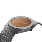 Silver Safra watch by Clasicio from the Dawr Collection, showcasing the brushed stainless steel finish and date window.